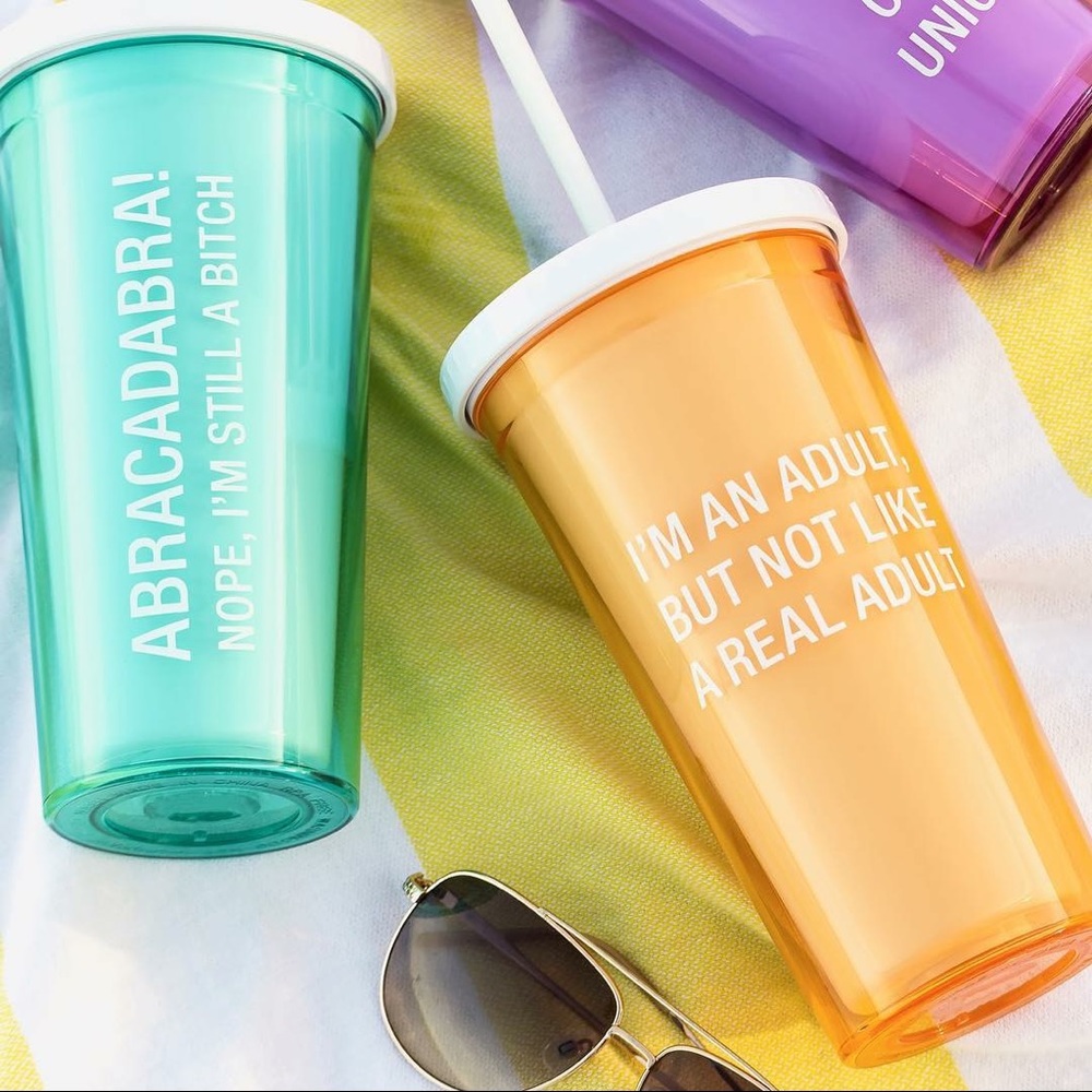 New plastic cup with lid & straw